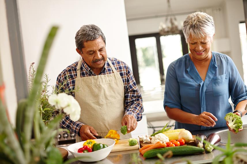 Couple cooking together at home